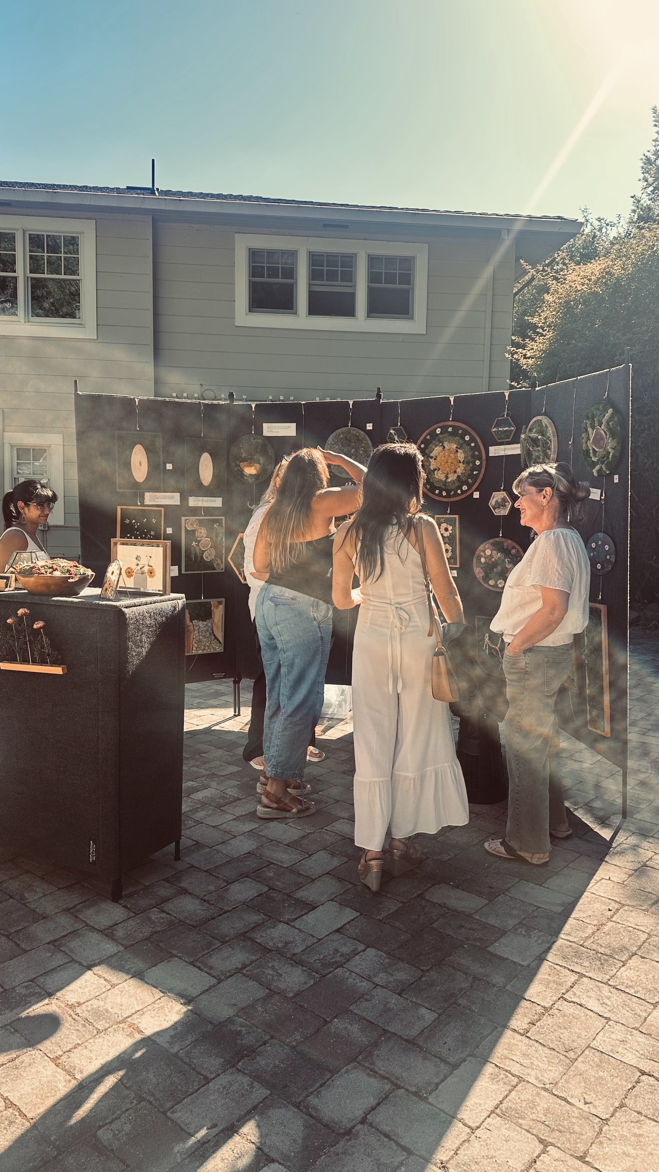 people talking to the moss design artist